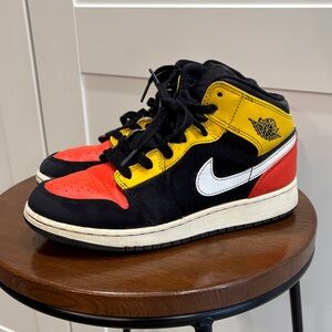 Nike High-Top Sneakers in Black, Red, and Yellow